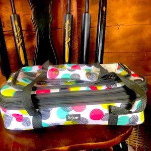 Thirty One casserole Dish cooler. Comes with new still package serving utensils.